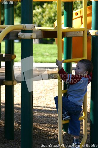 Image of Kid Climbing Up the Slider