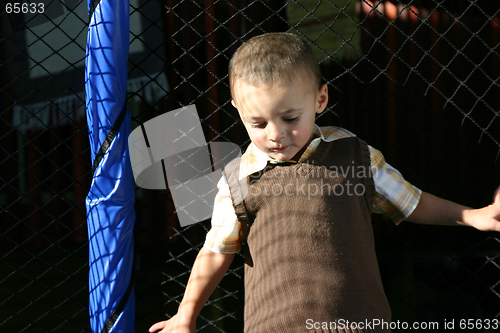Image of Little Boy Looking Down