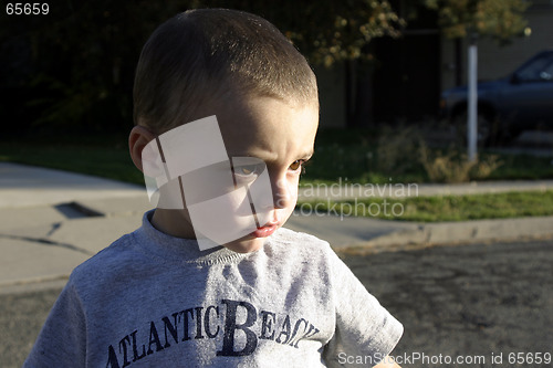 Image of Little Boy Looking Serious