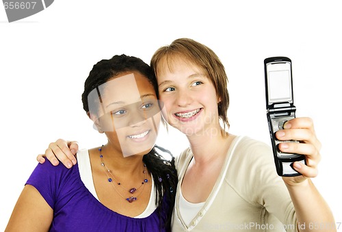 Image of Teen girls with camera phone