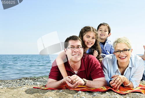 Image of Happy family at beach