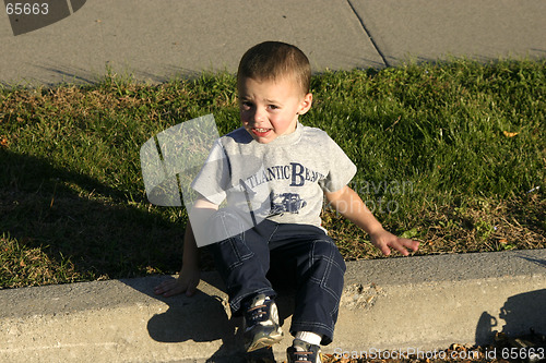 Image of Little Boy Looking into the Sun