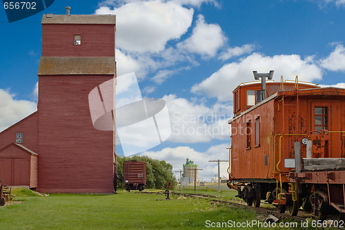 Image of Grain Elevator With Train