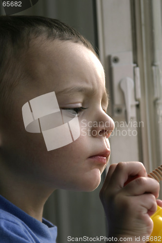 Image of Close Up on Child and His Undivided Attention