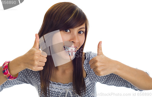 Image of woman with british flag on tongue