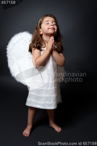 Image of Praying angel with hands together in worship