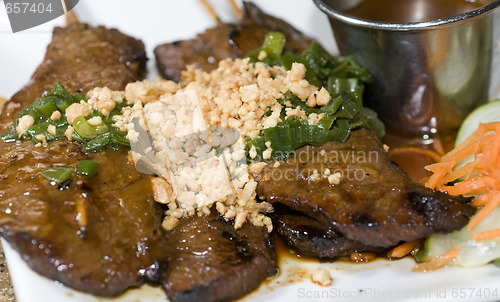 Image of vietnamese food bo nuong sate grilled beef sate skewers with cru