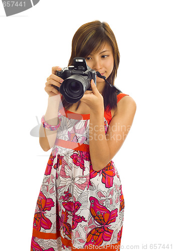 Image of woman with a digital camera