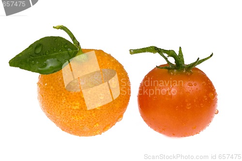 Image of mandarin, calamondin and small tomato