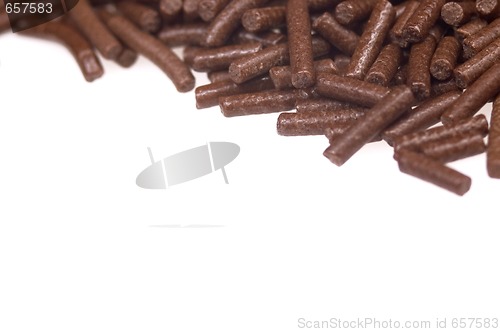 Image of 
chocolate sprinkles on white background. frame