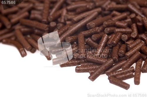 Image of 
chocolate sprinkles on white background. frame