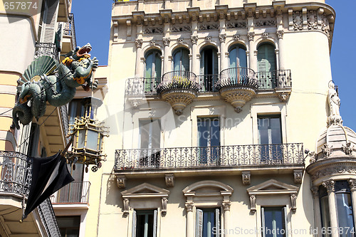 Image of dragon and umbrella in Ramblas street,Barcelona