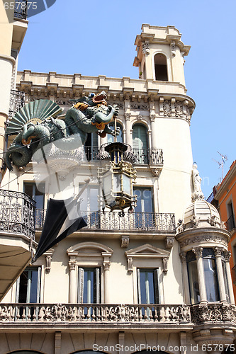 Image of dragon and umbrella in Ramblas street,Barcelona