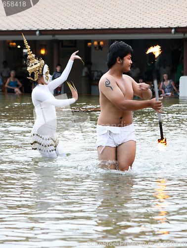 Image of PHUKET - AUGUST 19: Traditional Thai dancers perform a ceremony 