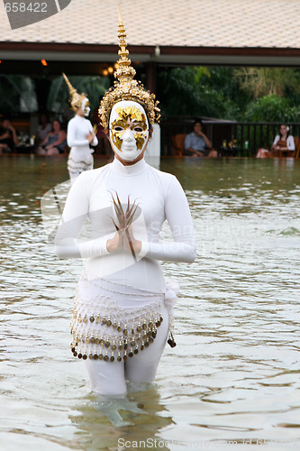 Image of PHUKET - AUGUST 19: Traditional Thai dancers perform a ceremony 