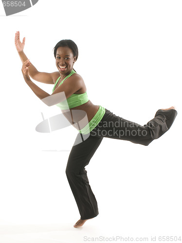 Image of young pretty hispanic african american woman exercising dance ba