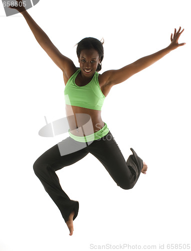 Image of young pretty hispanic african american woman exercising with fit