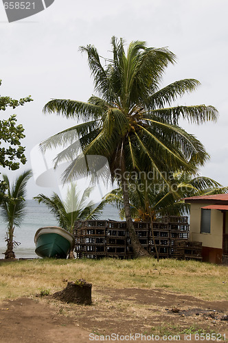 Image of fishing boat lobster traps native house nicaragua