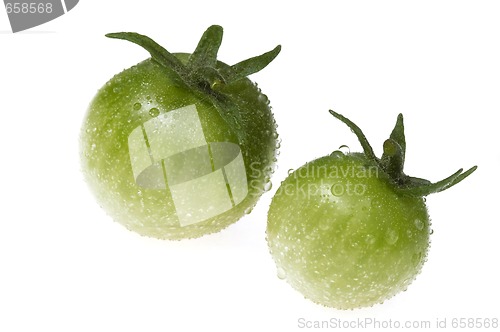 Image of green tomato on white