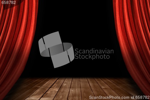 Image of Red Theater Stage Drapes With Wooden Floor