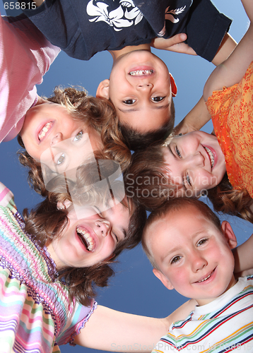 Image of Five Silly Friends Huddles and Laughing