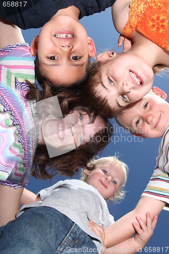 Image of Happy Smiling Young Kids Outside Having Fun