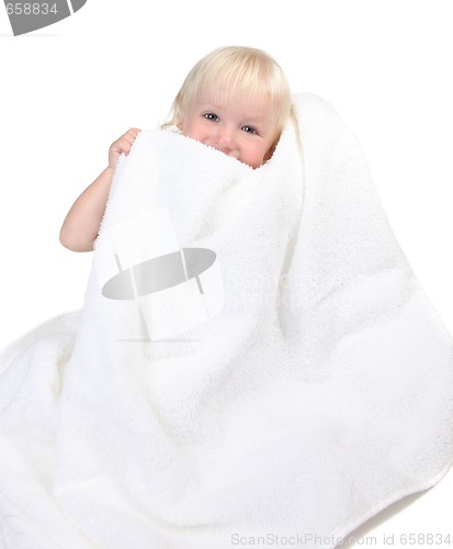 Image of Adorable Baby Boy Holding Towel to His Face Smiling