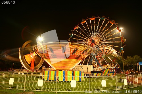 Image of Vintage Carnival at Night With Motion Blur