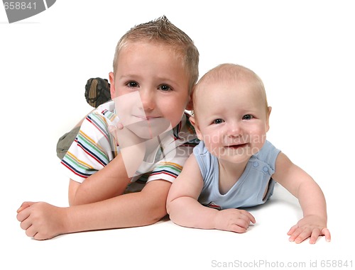 Image of Young Brothers Lying on Their Stomachs