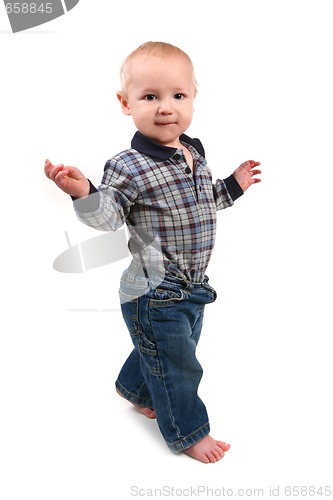 Image of Adorable Toddler Boy Walking Sideways