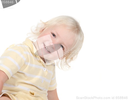 Image of Happy Smiling Toddler Looking While Leaning Over