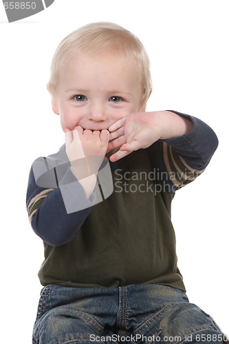 Image of Baby Boy With Fingers in His Mouth
