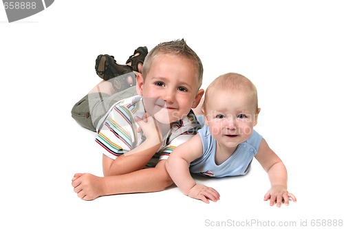 Image of 2 Brothers Posing for a Portrait Lying Down