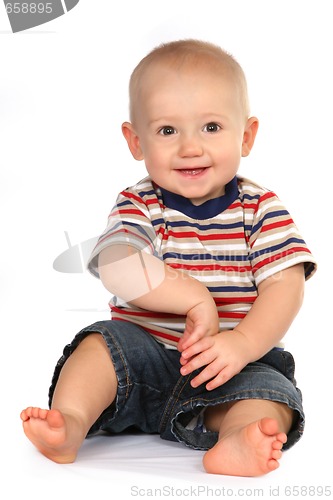 Image of Cute Baby Boy Toddler Sitting and Holding Hand