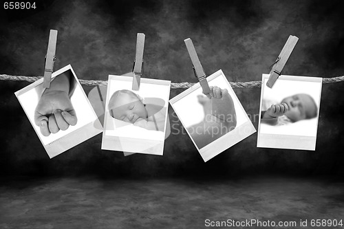 Image of Black and White Photos Hanging on a Rope