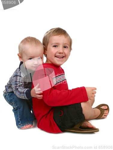 Image of Two Brothers Smiling and Sitting Together