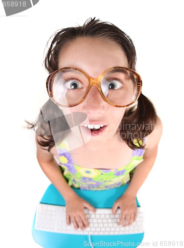 Image of Funny Young Child Working on a Computer