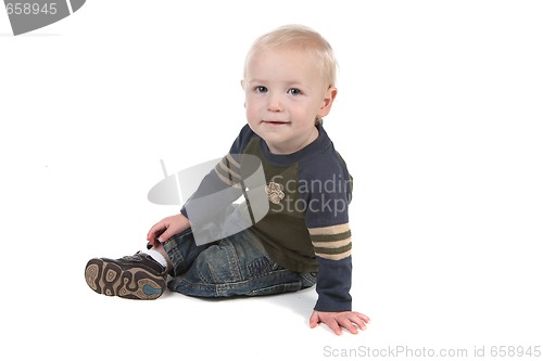 Image of Sweet Young Baby Boy Sitting Sideways