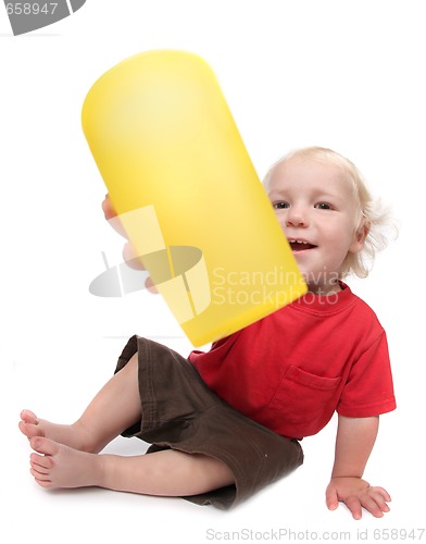 Image of Baby Boy Giving His Drink Cup Away