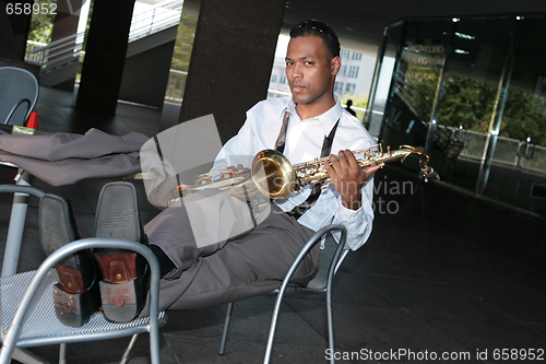 Image of Jazz Musician Resting Ready to Play Again