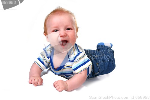 Image of Laughing Baby Infant Boy Lying on His Tummy