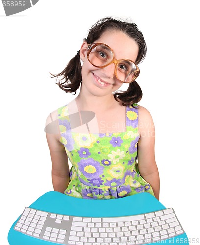 Image of Girl Wearing Eyeglasses Using a Computer