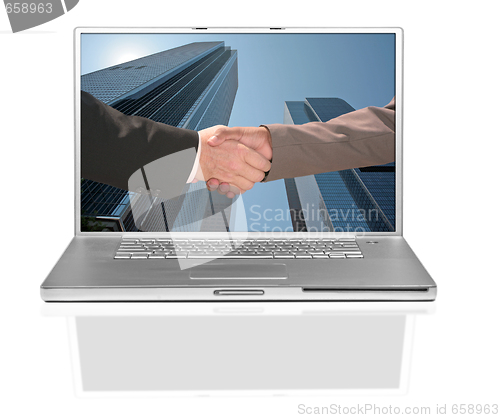Image of Business Men Handshake on a Computer Screen