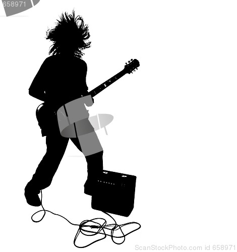 Image of Teenage Boy Silhouette Playing Guitar