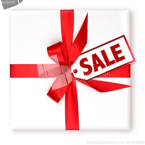 Image of Pretty Wrapped Holiday Gift With Decorated SALE Tag