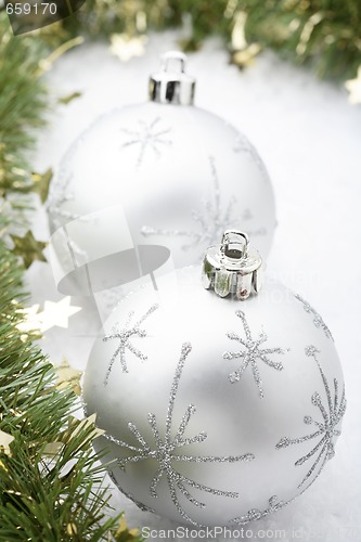 Image of Silver Christmas baubles.