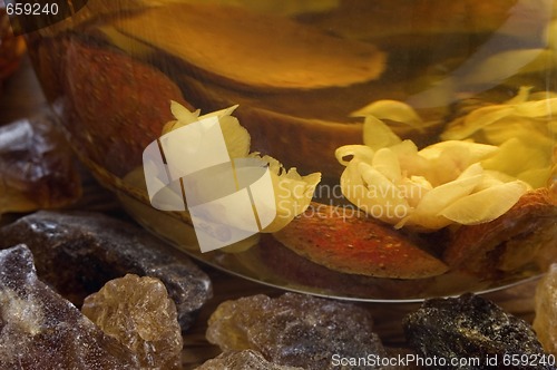 Image of tea. fruits and flowers.