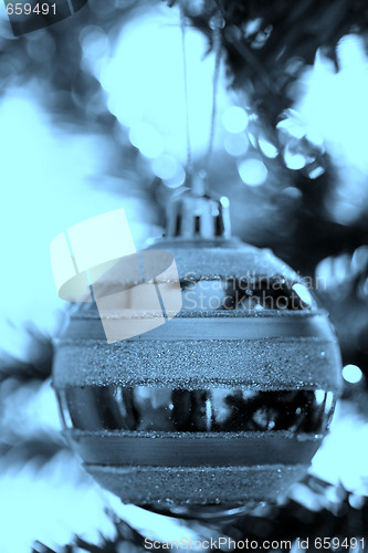 Image of Christmas ornaments on tree.