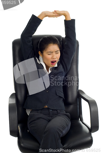 Image of business woman yawning