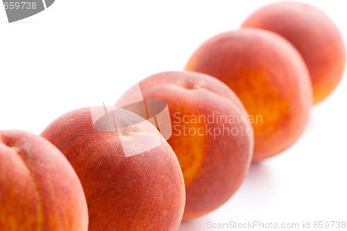 Image of five peaches